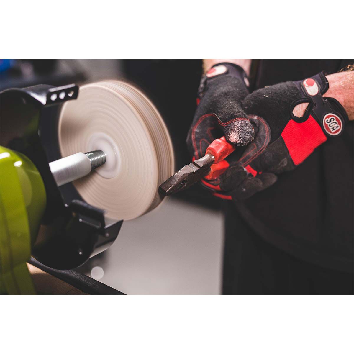 Buffing wheel outlet for bench grinder