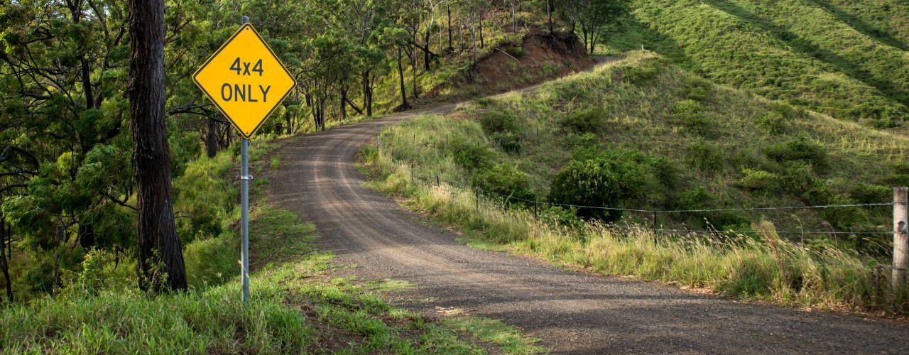 4x4 sign with gravel roads