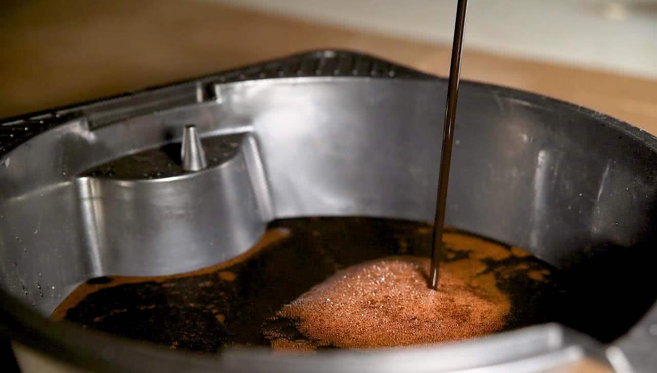 Oil draining into oil pan