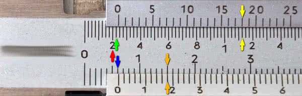 How do I read a manual vernier caliper?