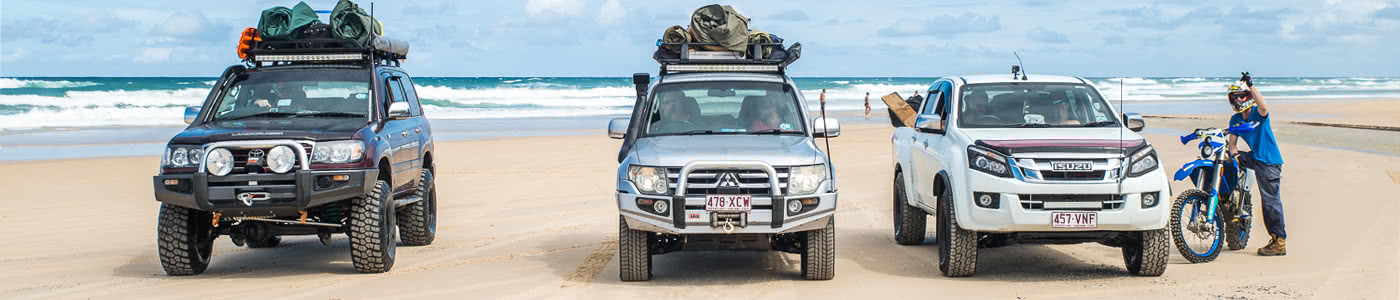 Cars parked on Fraser Island Beach